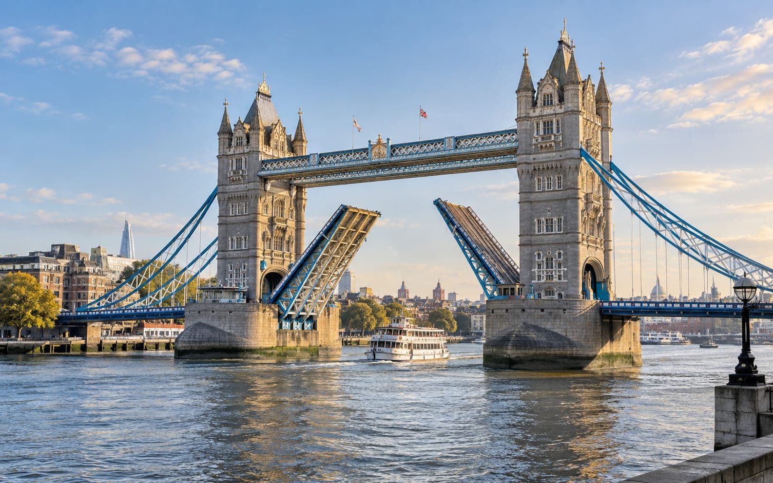 Tower Bridge raised over the River Thames on a clear morning