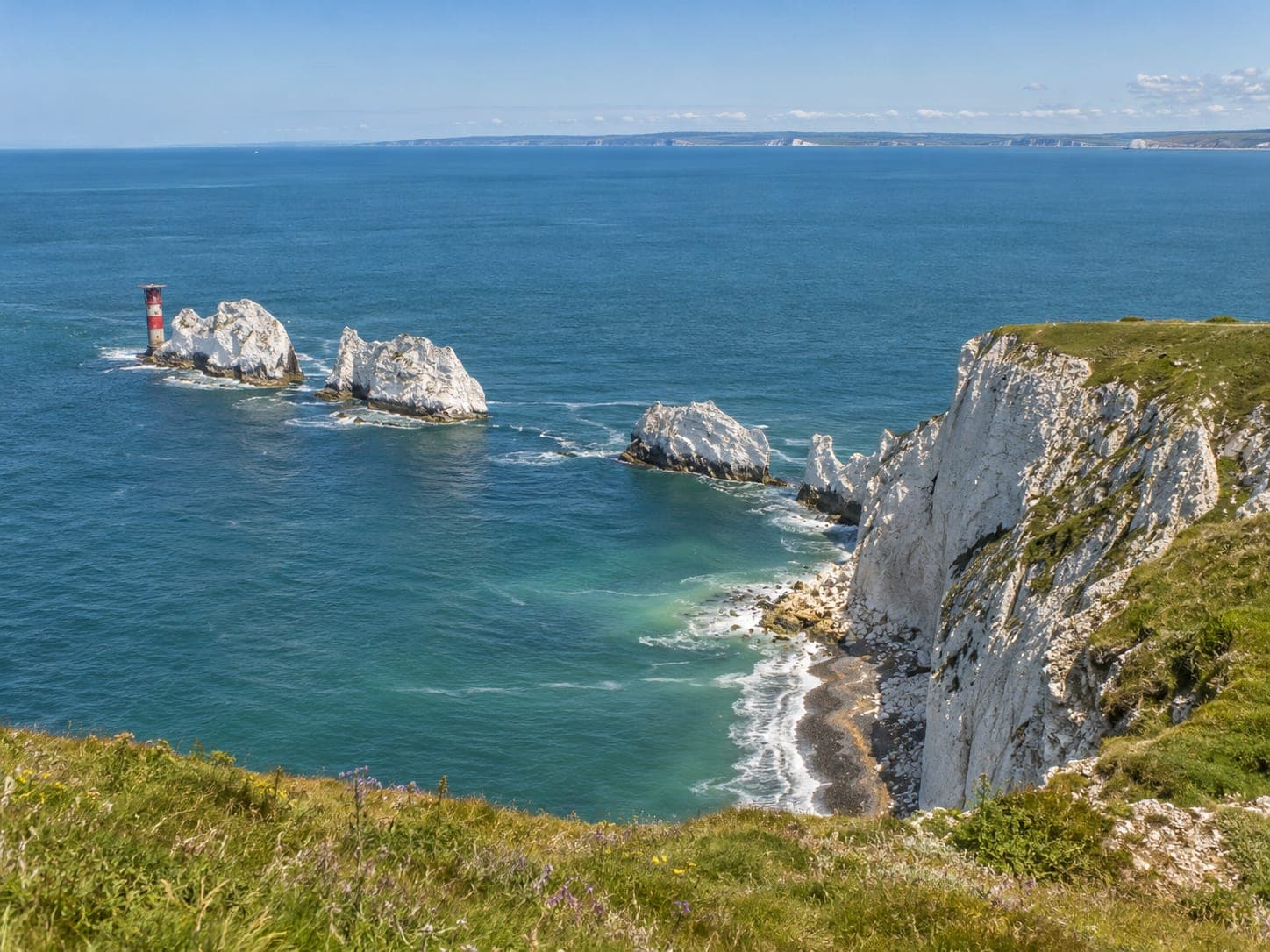 White chalk stacks rising out of the sea at the Needles